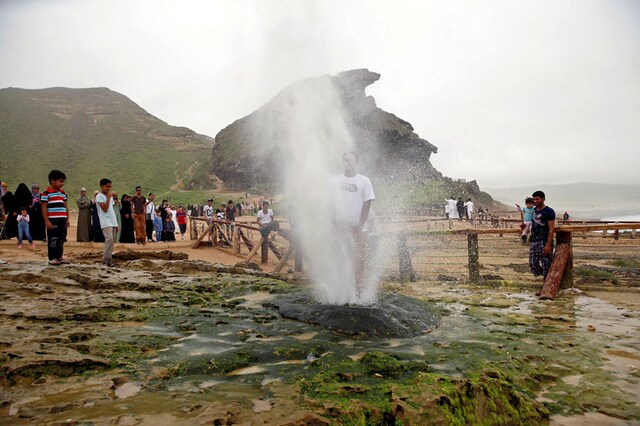 Tourists gather around a natural fountain at Al Maghseel beach in Salalah, Dhofar province, Oman. (Photo courtesy: Reuters/ File pic)