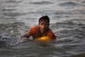 Rohingya Boy Can't Swim, But Floats on Oil Container to Bangladesh