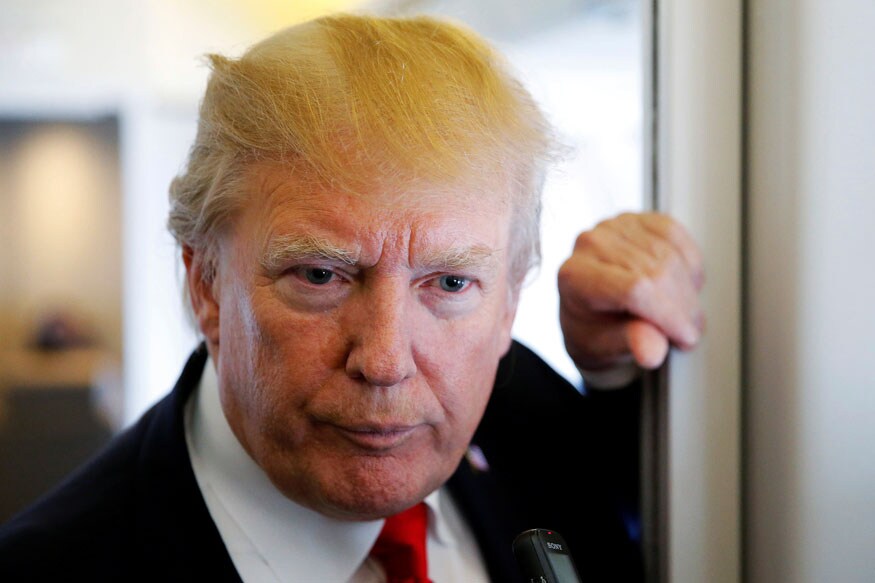 Trump Jokes on Infamous Hairstyle, Says 'I Try Like Hell to Hide Bald Spot'