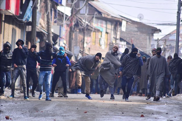 In this file photo, Kashmiri young protesters are seen throwing stones towards security forces (Getty images)