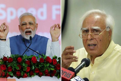 File photo of PM Narendra Modi and senior Congress leader Kapil Sibal 