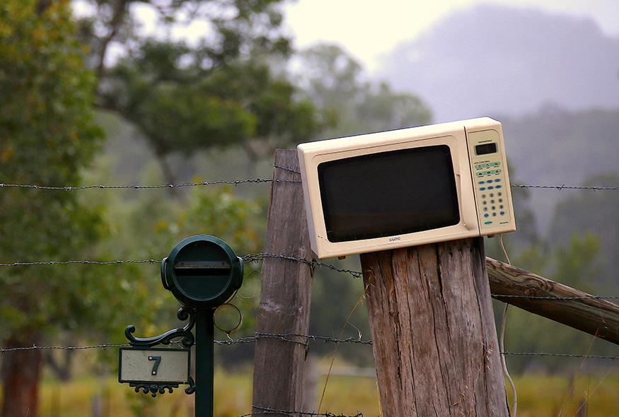 An old microwave used as a mailbox can be seen next to a more traditional box along a road on the outskirts of the township of Wollombi, north of Sydney, Australia. (Image: Reuters) An old microwave used as a mailbox can be seen next to a more traditional box along a road on the outskirts of the township of Wollombi, north of Sydney, Australia February 25, 2017. Picture taken February 25, 2017. (Image: Reuters)
