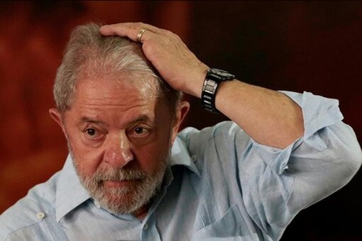 Former Brazilian president Luiz Inacio Lula da Silva reacts during a meeting with members of the Workers Party (PT), that decided Lula da Silva will be its candidate again in the 2018 election. (REUTERS/Leonardo Benassatto)