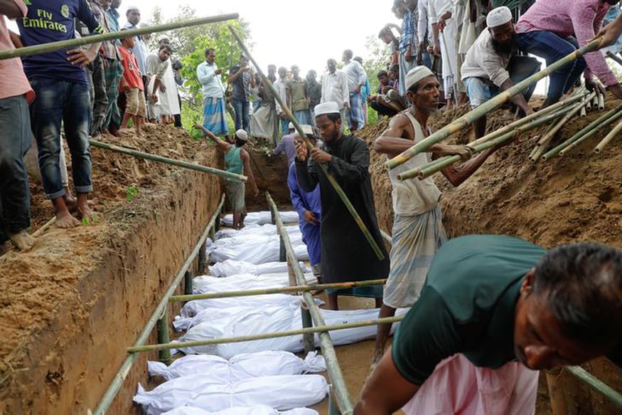 One Grave for 10 Rohingya: How Myanmar Forces Ravaged a Remote Village