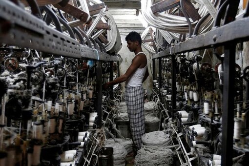 An employee works inside a garment factory. (Representative Image: Reuters)