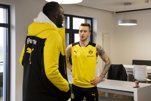 Usain Bolt with Marco Reus at Borussia Dortmund's training center (Image: Usain Bolt/Twitter)