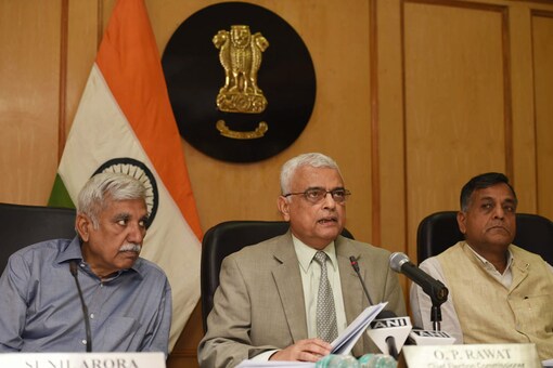Chief Election Commissioner (CEC) O P Rawat with Election Commissioners Ashok Lavasa and Sunil Arora at a press conference in New Delhi. (Image: PTI)