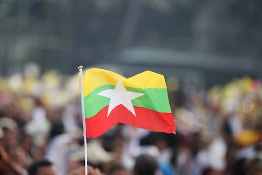 File Photo of Myanmar Flag. (Image: Reuters) File Photo of Myanmar Flag. (Image: Reuters)