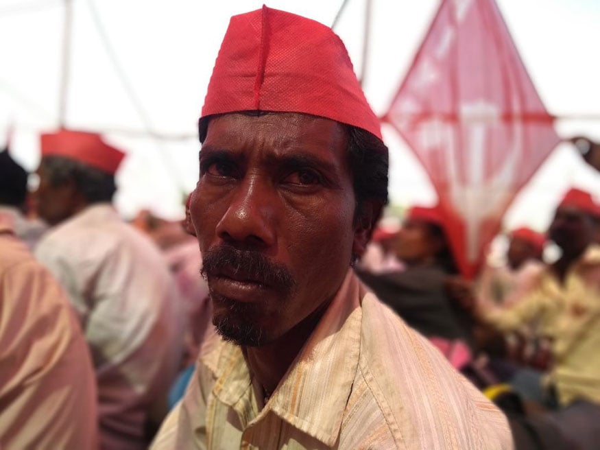 Pushparaj Bhaudu Gotarne, resident of Borwan village in Dhundri, Nashik District, father of five children. A member of the tribal community from Nashik, Pushparaj wants ownership of his ancestral forest land of 4.5 acres which he has been tilling since his childhood. (Image: Manish Dubey/News 18) Pushparaj Bhaudu Gotarne, resident of Borwan village in Dhundri, Nashik District, father of five children. A member of the tribal community from Nashik, Pushparaj wants ownership of his ancestral forest land of 4.5 acres which he has been tilling since his childhood. (Image: Manish Dubey/News 18)