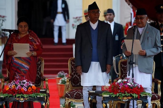File photo: Nepalese President Bidhya Devi Bhandari (L) administers the oath of office to the newly-elected Prime Minister Khadga Prasad Sharma Oli. (Image: Reuters) File photo: Nepalese President Bidhya Devi Bhandari (L) administers the oath of office to the newly-elected Prime Minister Khadga Prasad Sharma Oli. (Image: Reuters)