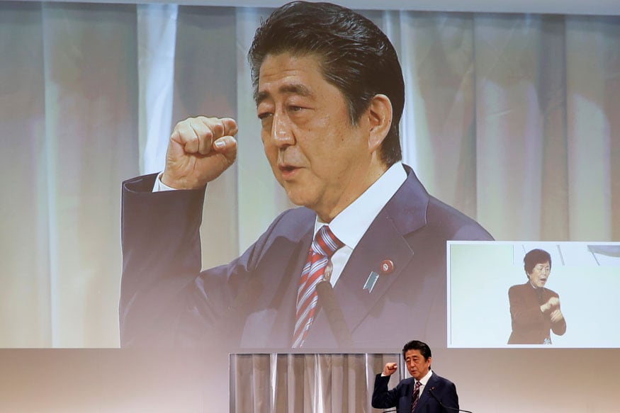 japans shinzo abe apologises amid cronyism scan