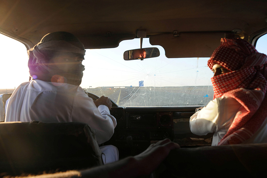 Arabian men with car