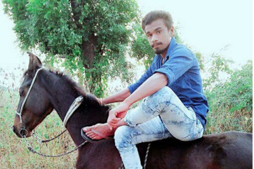 File photo of Pradip Rathod, a Dalit, who was allegedly killed for riding a horse. 
