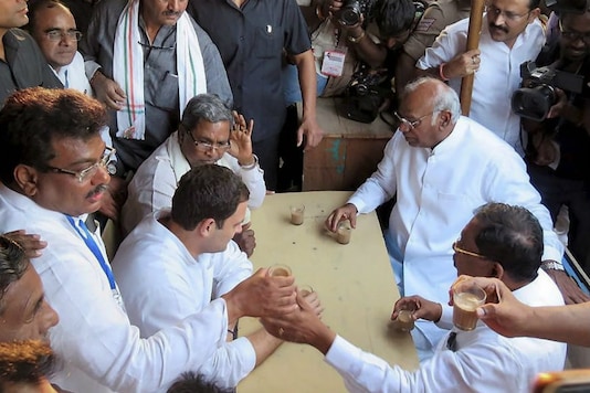 Congress president Rahul Gandhi, Karnataka CM Siddaramaiah, former Union minister Mallikarjun Kharge and other party leaders at a stall in Vijayapura. (File photo: PTI) Congress president Rahul Gandhi, Karnataka CM Siddaramaiah, former Union minister Mallikarjun Kharge and other party leaders at a stall in Vijayapura. (File photo: PTI)