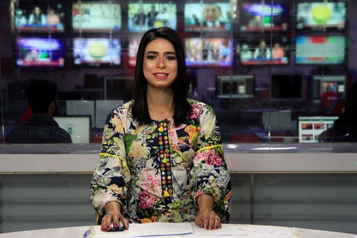 Marvia Malik, Pakistan’s transgender news anchor, smiles during a news session at the Kohenoor News channel in Lahore, Pakistan April 13, 2018. (Image: Reuters)