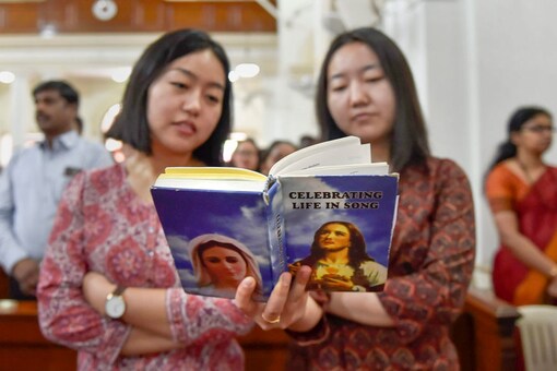 People attend a mass at Sacred Heart Cathedral Church on the occasion of Easter in New Delhi. (Image: PTI) 