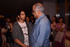 Ishaan Khatter chats with Boney Kapoor during the special screening of 'Beyond the Clouds' in Mumbai. (Image: Viral Bhayani)