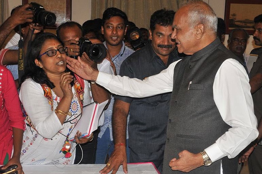 TN Governor Banwarilal Purohit chose to respond to questions of a journalist by patting on her cheek. (Photo: @lakhinathan)