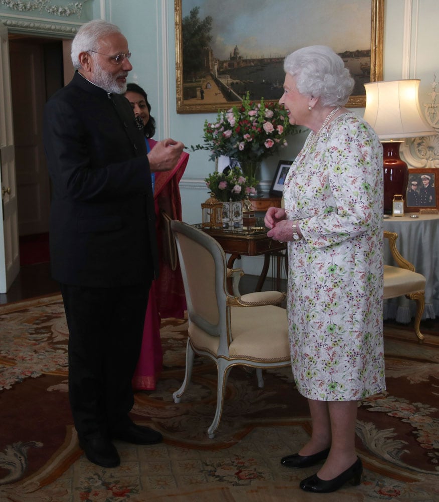PM Narendra Modi is greeted by Britain's Queen Elizabeth during a private audience at Buckingham Palace, London. (Image: AP)