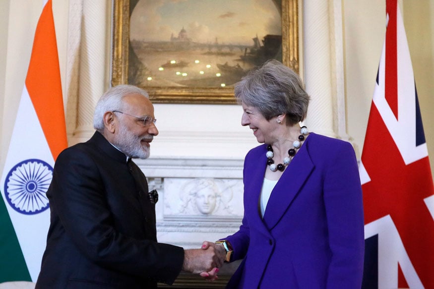 Britain's Prime Minister Theresa May shakes hands with Narendra Modi, the Prime Minister of India during a bilateral meeting at 10 Downing Street in London. (Image: AP/PTI)