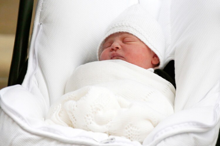 Britain's Catherine, the Duchess of Cambridge and Prince William leave the Lindo Wing of St Mary's Hospital with their new baby boy in London