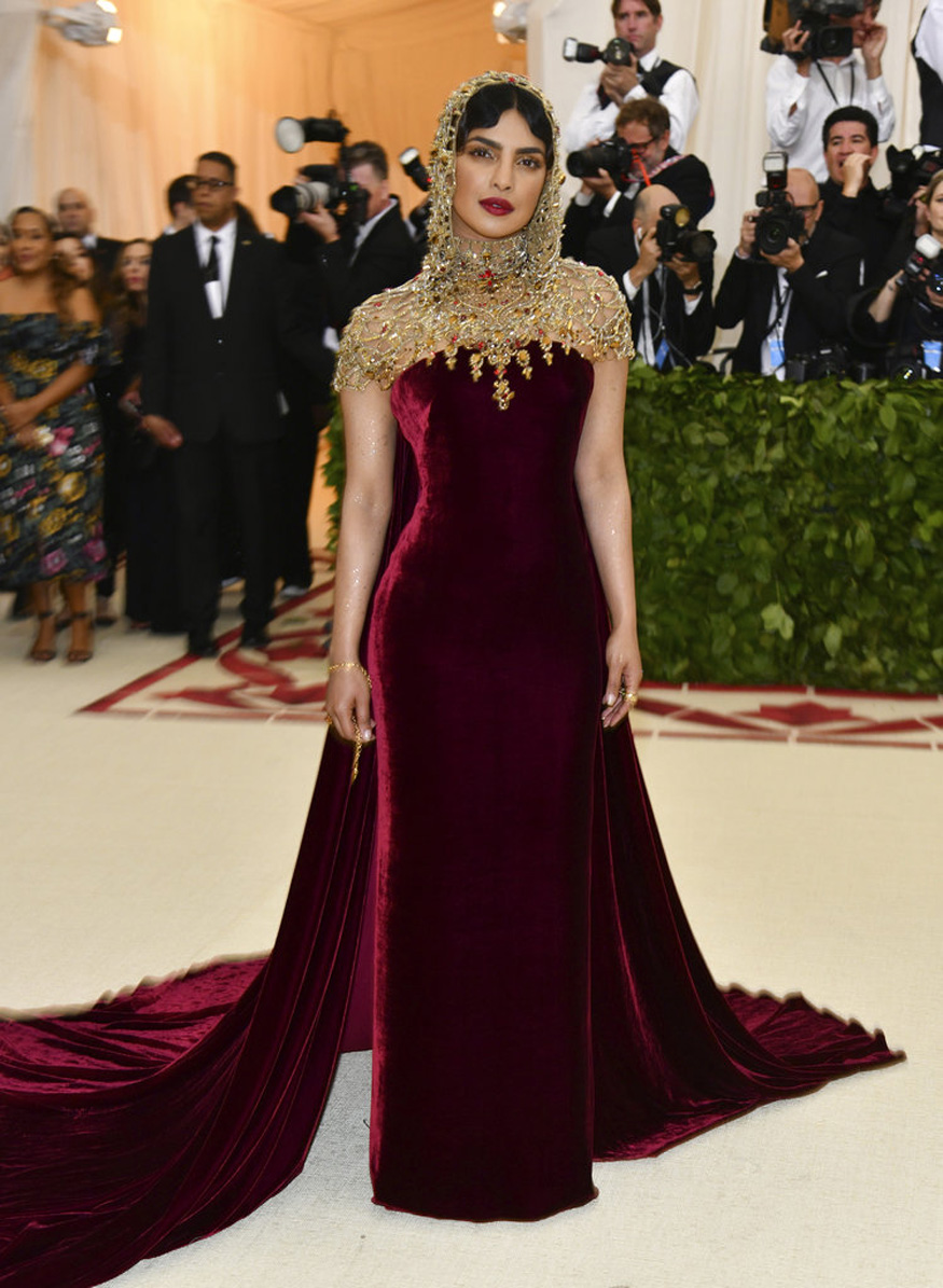 Priyanka Chopra Dons Crimson Velvet at Catholic-Inspired Met Gala