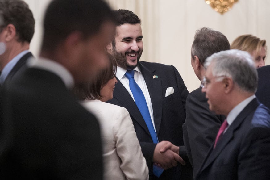 Saudi Arabia ambassador to the United States, Prince Khalid bin Salman bin Abdulaziz, center, attends an iftar dinner, celebrating Islam's holy month of Ramadan, in the State Dining Room of the White House Wednesday, June 6, 2018, in Washington. (AP Photo/Andrew Harnik)