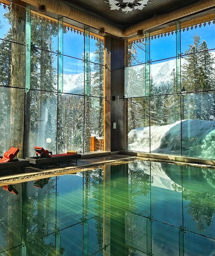 The Khyber - If you’re tired of the humdrum city life and scorching heat, the Khyber Himalayan Resort and Spa is the perfect destination to relax. It is located at a distance of 65kms from the Srinagar Airport. The ethereal Pir Panjal ranges and the Apharwat Peak are a sight to behold and the spa therapy offered by the resort is top of the class. If you’re looking for something adventurous then you can also try skiing on the beautiful snow-clad hills. (Image: Instagram)