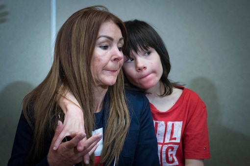 Billy Caldwell sits with his mother Charlotte.  (Image: AP)