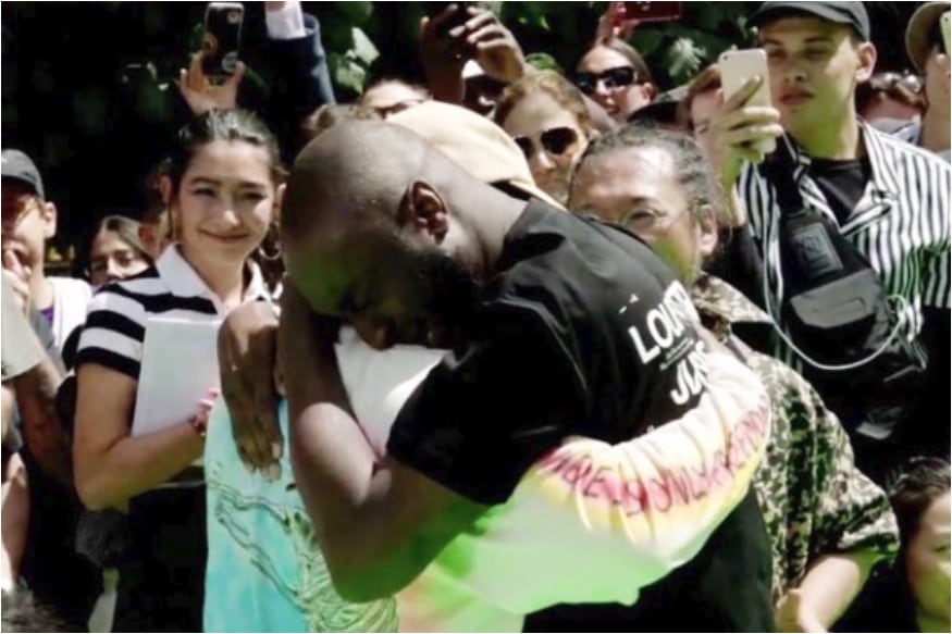 Virgil Abloh and Kanye West share an emotional hug at Paris Fashion Week
