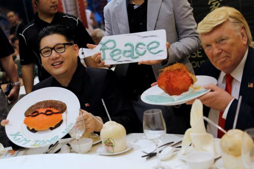Trump and Kim Doppelgangers Hold 'Singapore Summit' Day Before the Real Deal