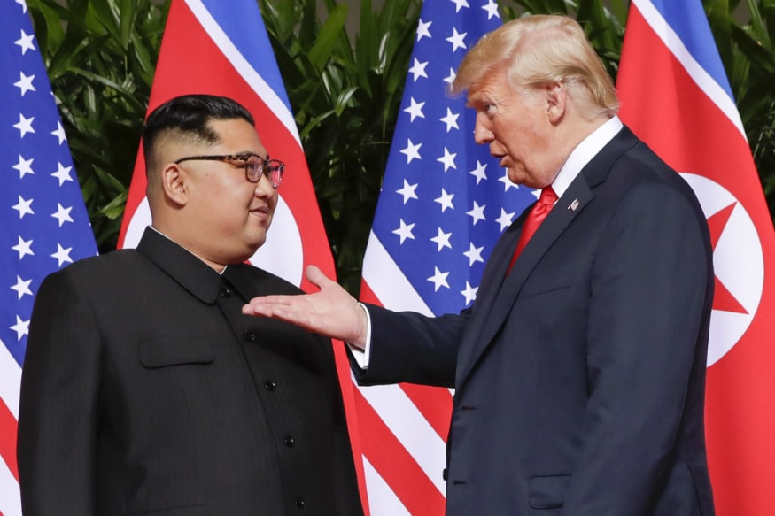 Body Language Experts Decipher Trump and Kim's First 60 Seconds Together