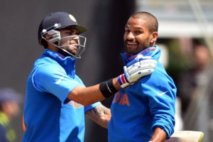 Shikhar Dhawan celebrates with Virat Kohli after bringing up his maiden ODI hundred. IMAGE: AFP PHOTO