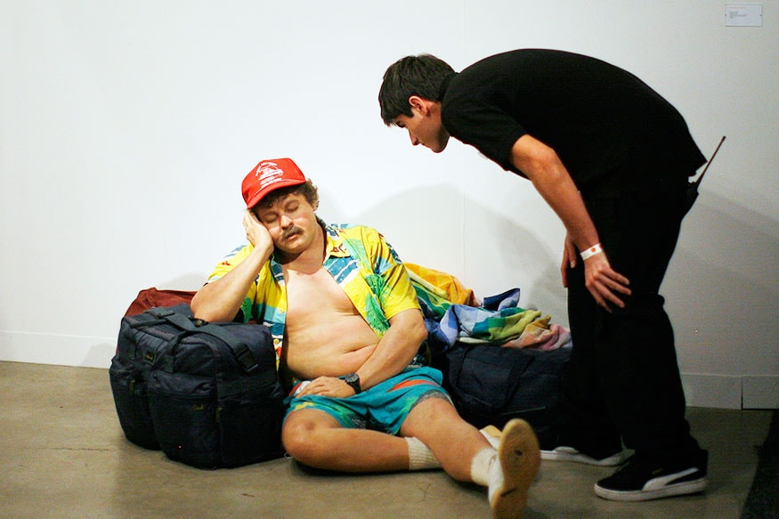 A man looks at a sculpture by Van De Weghe of US during the Art Basel show in Miami Beach, Florida. Art Basel Miami Beach is the sister event of Switzerland's prestigious Art Basel show. (Image: Reuters)