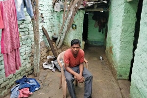 Arun-Kumar,-son-of-rickshaw-puller-Baijnath-Ravidas-in-Dhanbad.-He-remembers-his-hungry-father-waiting-for-food-till-his-last-breath