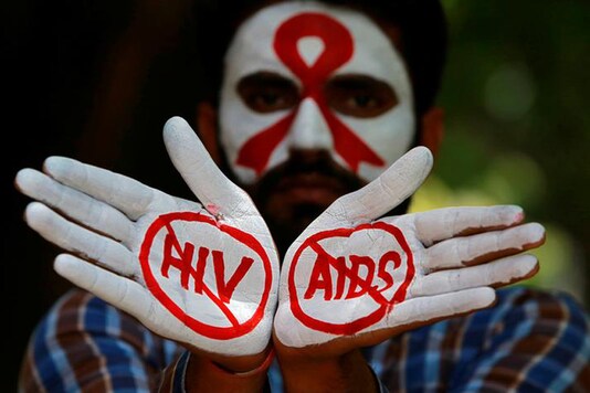 A student displays his hands painted with messages on HIV (Photo: Reuters)