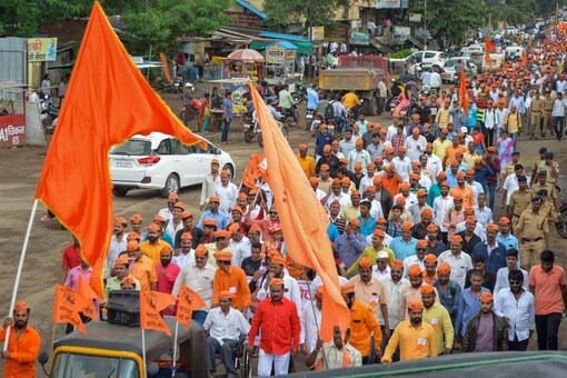 Protestors from the Maratha community take part in a rally demanding reservation, in Karad on Tuesday (Image: PTI)