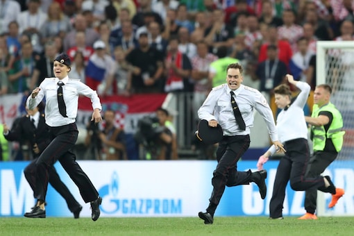 Punk Band Pussy Riot Claims Responsibility After Intruders Run On To The Pitch In World Cup