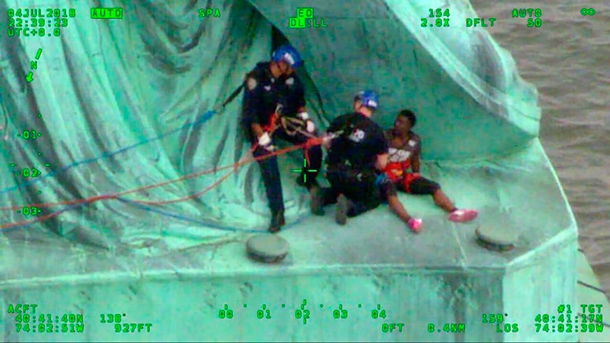 Statue of Liberty Base Climber Identified, Charged With Trespassing ...