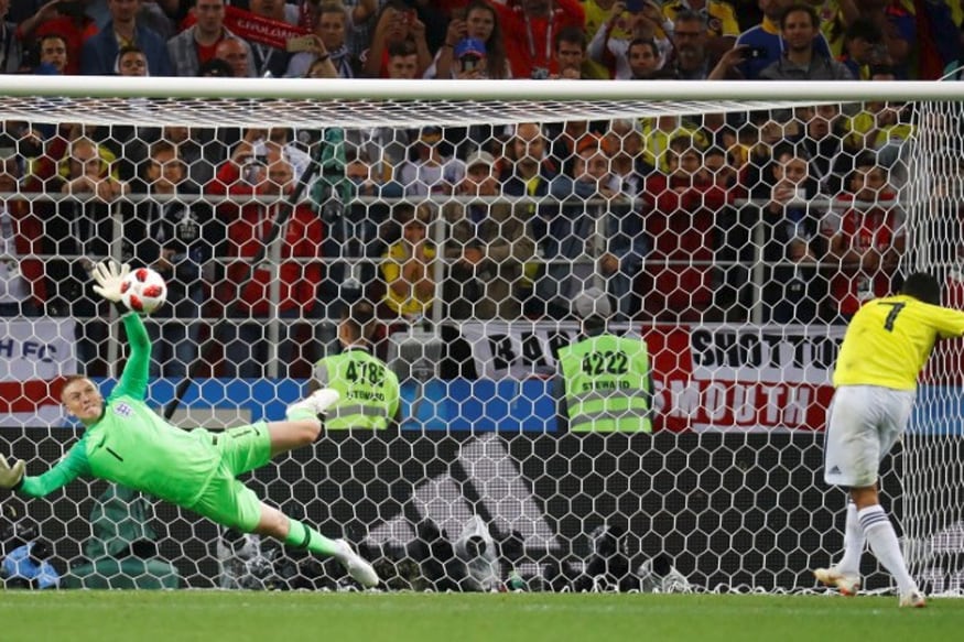 Jordan Pickford saves the penalty for England. (REUTERS)