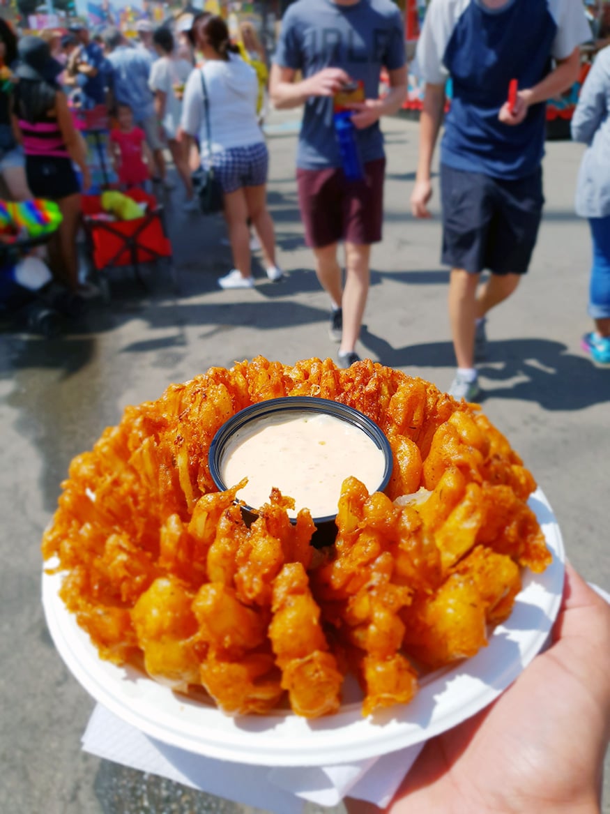 Giant Onion Rings, one of the hot-selling food at the annual 'Stampede' event in Calgary, Canada. (Image: News18/Varun Sharma)
