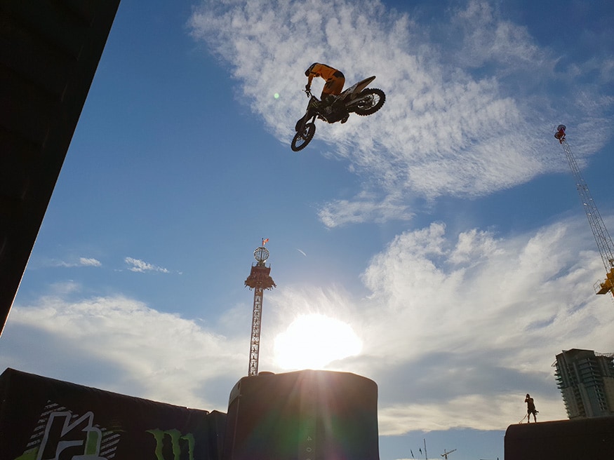 A daredevil biker in his elements during 'Stampede' event in Calgary, Canada. (Image: News18/Varun Sharma)