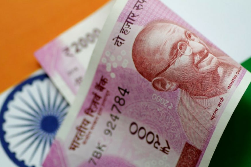 Rupee Gains 12 Paise Against Dollar in Early Trade