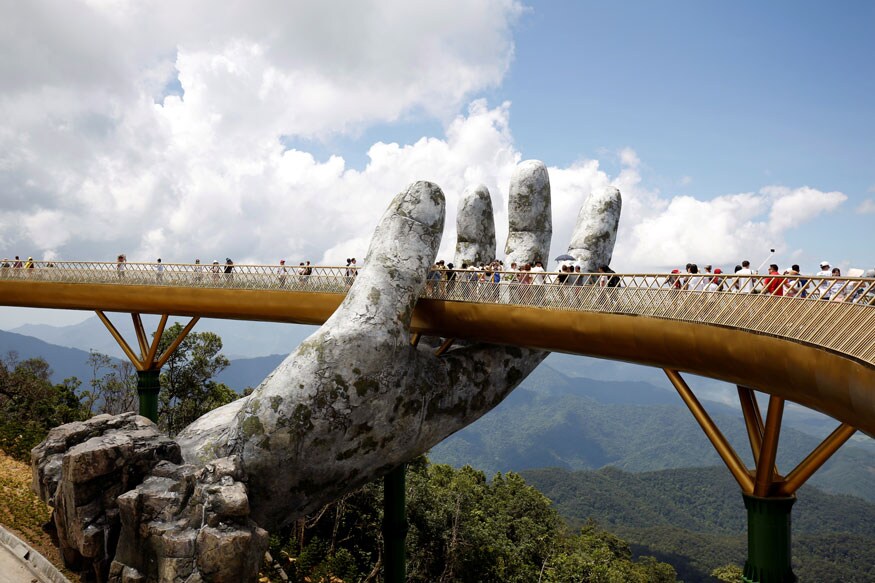 PHOTOS: Giant Hands Hold Vietnam's Golden Bridge