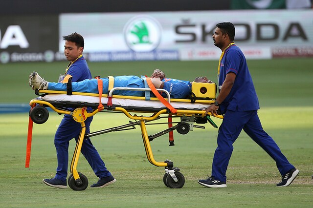 India's Hardik Pandya is taken out of the field on a stretcher after he fell after bowling a delivery during the one day international cricket match of Asia Cup between India and Pakistan in Dubai, United Arab Emirates, Wednesday, Sept. 19, 2018. (AP Photo/Aijaz Rahi)