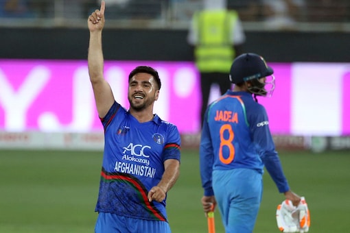 Afghanistan's Aftab Alam, left, celebrates the dismissal of India's Deepak Chahar during the one day international cricket match of Asia Cup between India and Afghanistan in Dubai. (AP Photo/Aijaz Rahi)