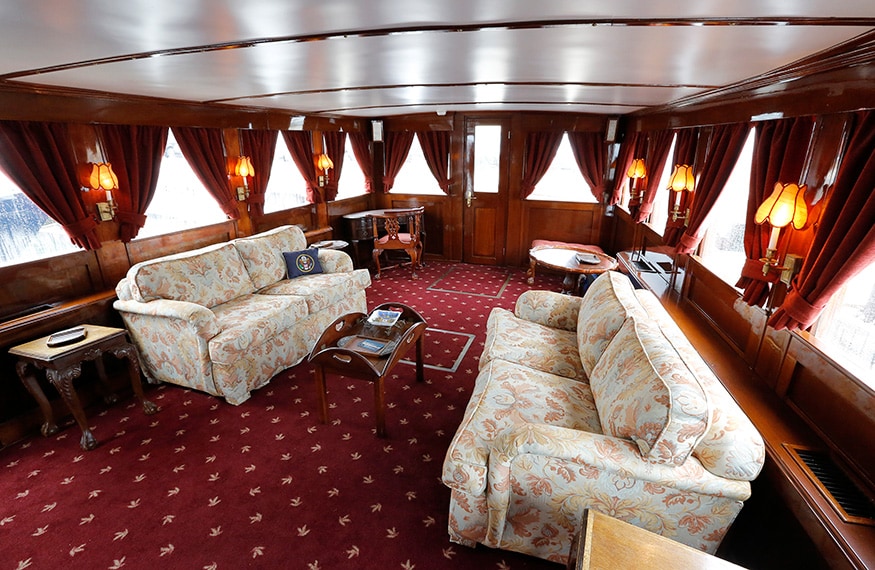 The salon on the former presidential yacht, Honey Fitz, is seen as it is docked in West Palm Beach, Florida. (Image: Reuters)