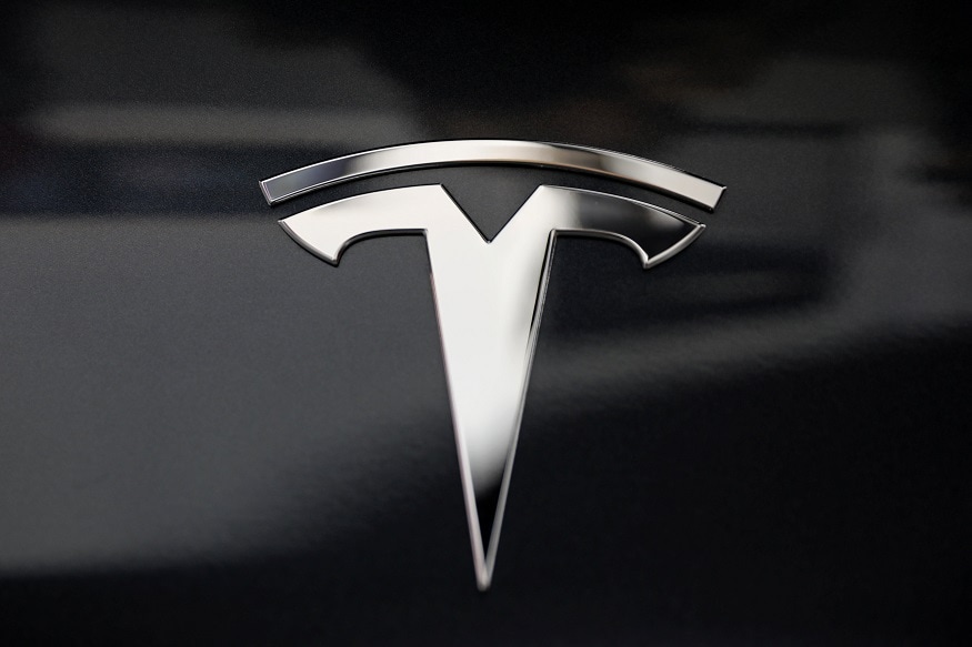 Tesla brand logo car symbol black and white design