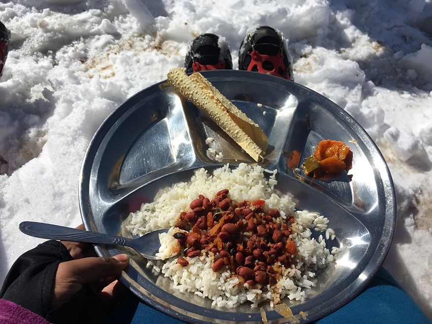 Enjoying the lovely meal cooked by the locals. Probably the most simple and the best food ever.(Image: Sneha Mitra)