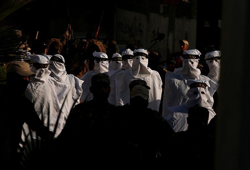 Palestinian Islamic Jihad militants participate in a military show in Gaza City. (Image: Reuters) Palestinian Islamic Jihad militants participate in a military show in Gaza City. (Image: Reuters)